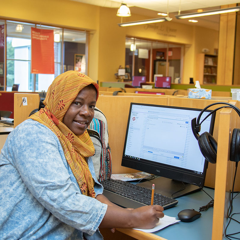 Student sitting at computer